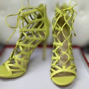 Yellow sandal by Guess